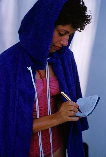 Woman writing in a notebook